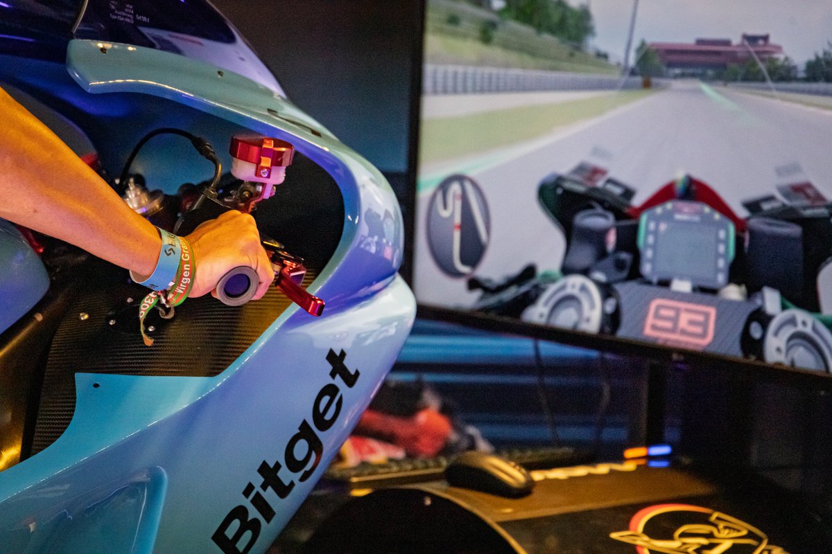 bitget's tweet photo. Final race day at the Catalunya circuit!🏁 

The crowd is buzzing, the energy unmatched, and our #MotoGPxBitget simulator puts fans right in the driver’s seat.

One last lap. One last chance. Glory awaits.⚡ 

Engines on—let’s #MakeItCount 🔥

#EventWithBitget https://t.co/z0RyOCwlmE