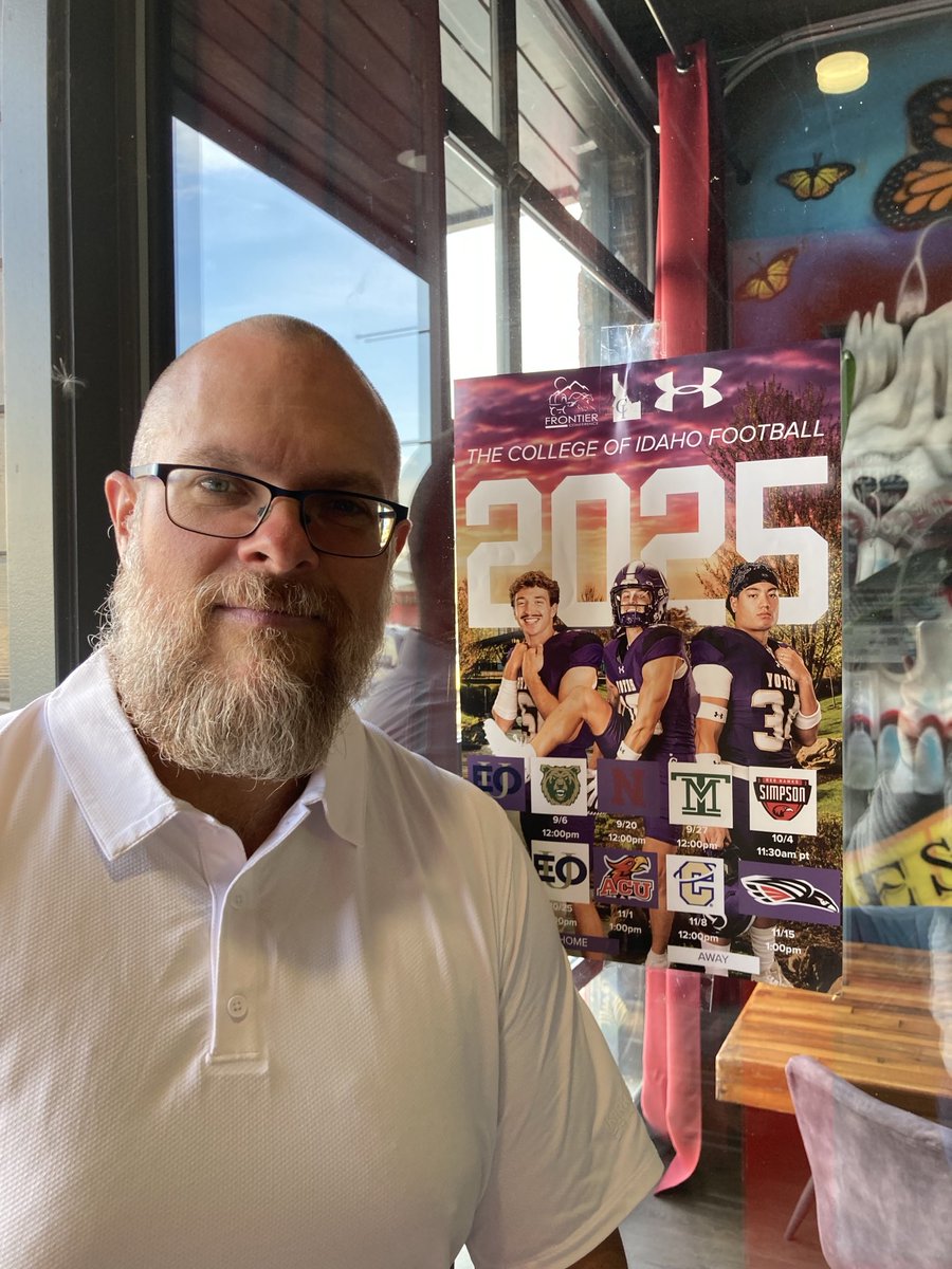 Went to dinner 🍽️ after Mass ⛪️ in downtown Caldwell and I see my guy ⁦<a href="/IRONGIRAFFE12/">Caden Young #12</a>⁩ on the ⁦<a href="/YotesFootball/">College of Idaho Football</a>⁩ poster !!
