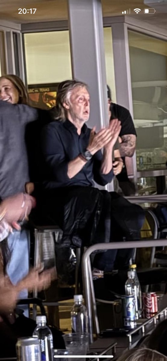 walruspauls's tweet photo. am i losing my mind or was paul wearing yellow submarine socks at oasis last night https://t.co/1r88sgfcYi