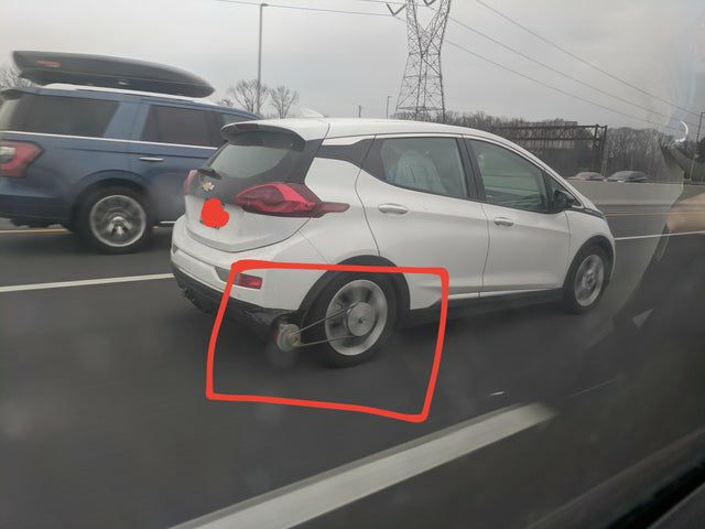 The owner of this electric car has attached a belt to the rear wheel and generator to his Chevy Bolt which charges the batteries while driving.

Now it's amazing to me that no multi billion dollar EV companies with all their "advanced" technology haven't thought about this