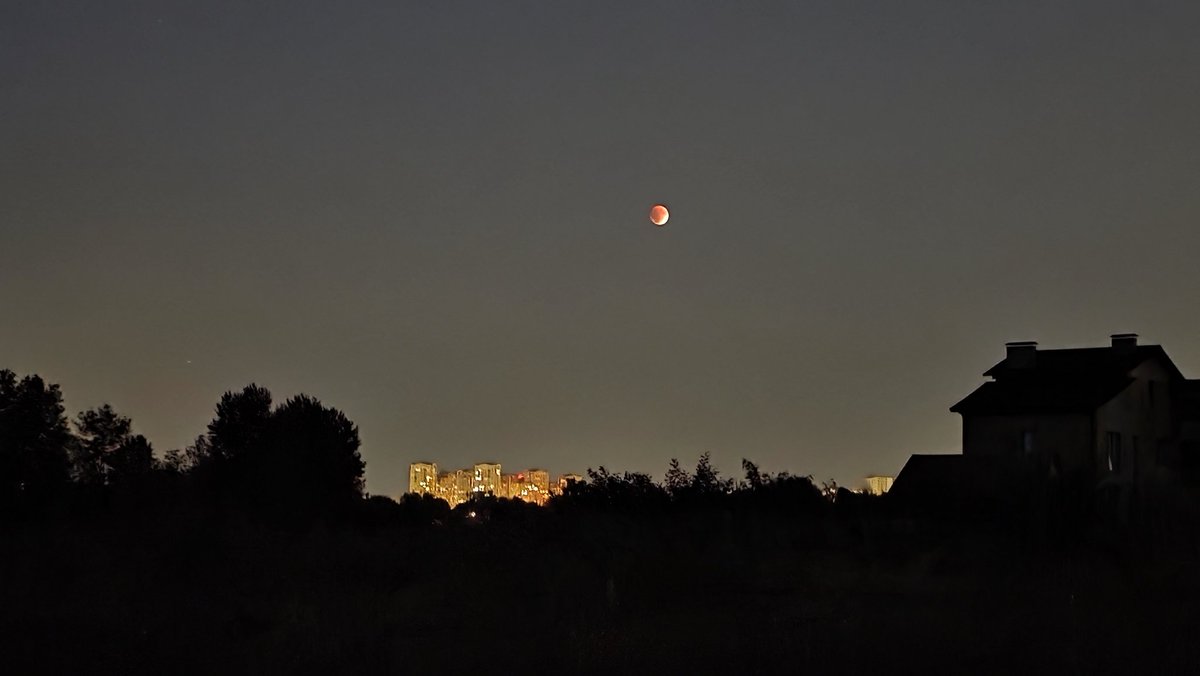 Today we was lucky enough to see the lunar eclipse  in Ukraine before the clouds came in. It was so exciting. I usually miss everything because of the clouds. But not today 😊
The camera can capture more than the human eye. In reality, I only saw a third of the orange color 🌃