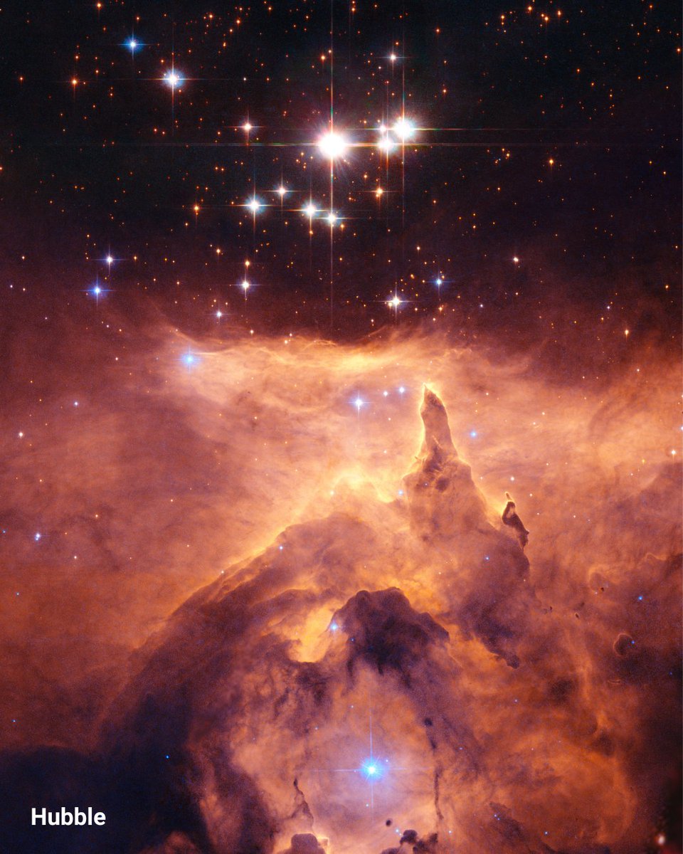 NASAHubble's tweet photo. Cosmic crags and clouds ☁️

Pismis 24 is a glittering star cluster, carving the dusty region seen below, as the stars emit intense ultraviolet radiation and stellar winds. https://t.co/acjR8YUGBD