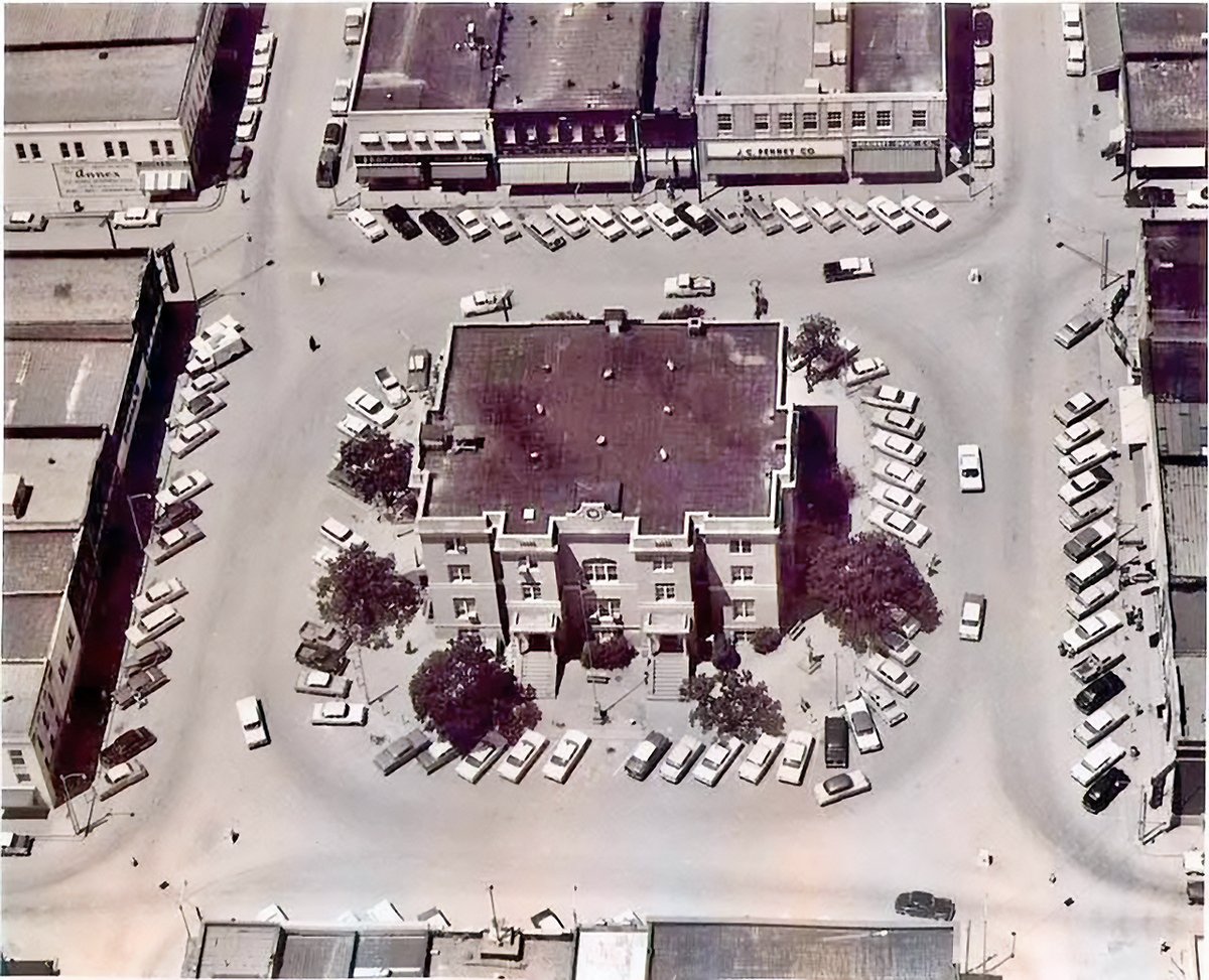Traces of Texas reader Jared Tye thoughtfully sent in this wonderful 1960 aerial shot of the courthouse square in McKinney, Texas. If you look closely, you can see the old J.C. Penney store above the courthouse, just right of center.

The Courthouse Square was established when
