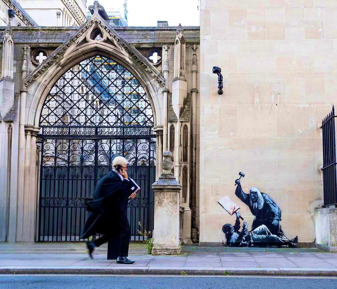 Banksy portrayed the declined political and legal class of the west, a tyranny on the people who put them in power. 
-Save the empire