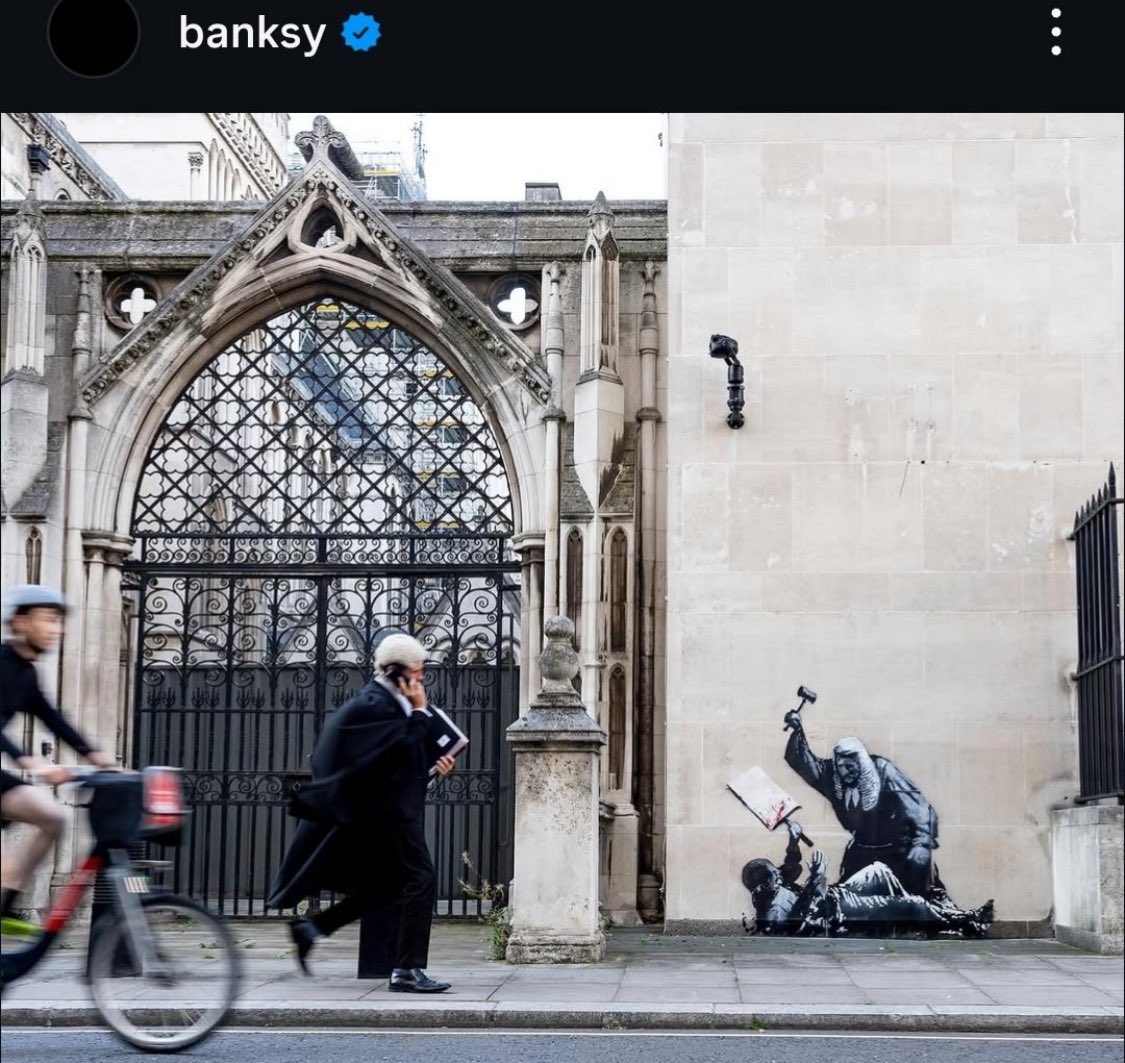 It’s a shame that everyone is cropping the surveillance camera from Banksy’s new artwork. It’s part of it.