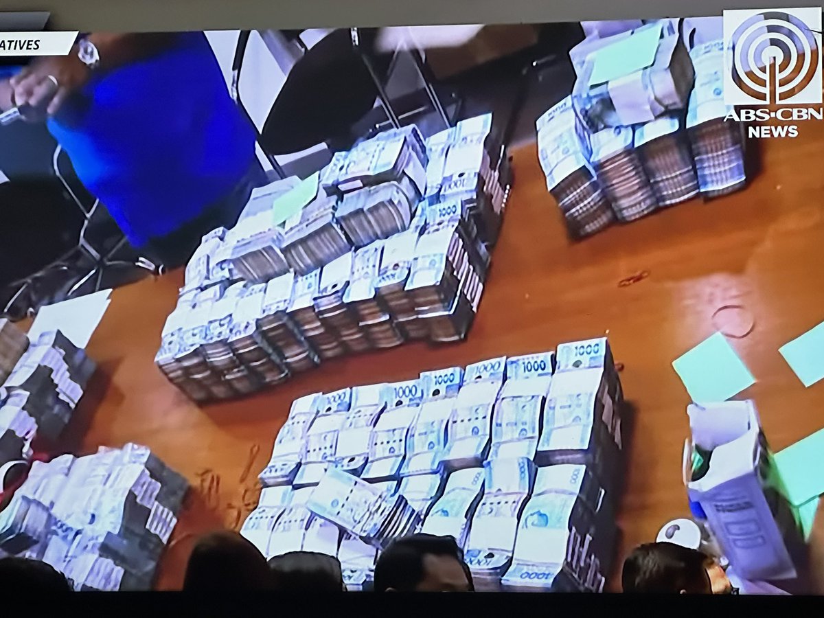 Engr. Brice captured this photo inside the DPWH office, showing piles of cash stacked on a table. Standing beside the money is Engr. Henry Alcantara. 

Grabe.