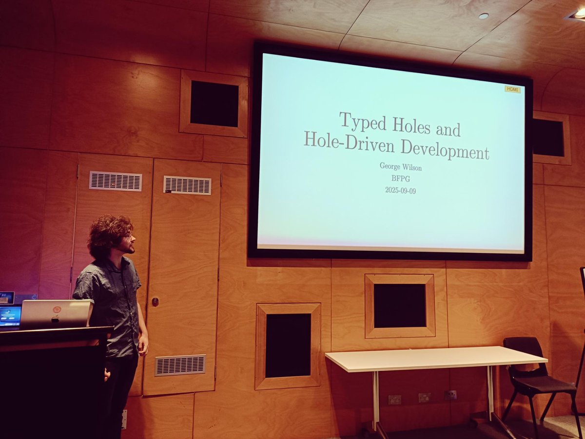 hackuador's tweet photo. George Wilson demoing typed holes and hole-driven development at Brisbane Functional Programming Group #BFPG #Haskell #FP https://t.co/HpJnIPmw4L