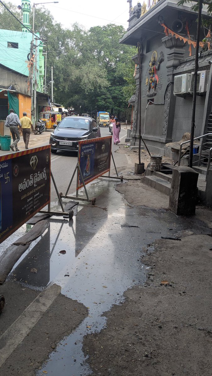 TheTweetOfMAD's tweet photo. @GHMCOnline @CommissionrGHMC Mint compound, Near Hanuman temple. Road becoming dirty &amp; dangerous. Yesterday few people on bikes fell down on this way.  Oil or some other liquid may be coming into the road from temple. Kindly take action. https://t.co/VfyGwJXkvN