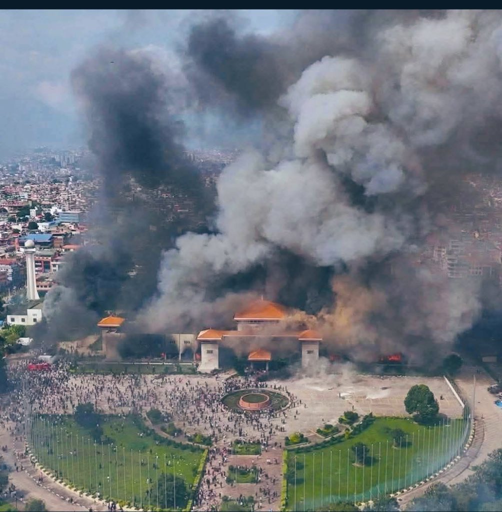 nehra73407's tweet photo. @cb_doge Breaking: Nepal Parliament set on fire https://t.co/55U1IWsNGa