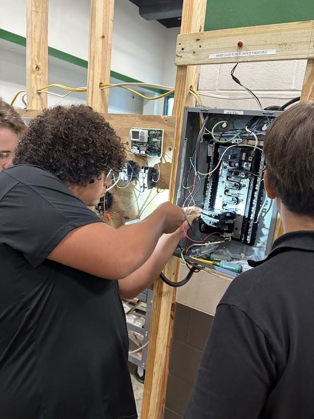 JBHenslerCCA's tweet photo. Mr. Cantu's HVAC 1 students are turning classroom theory into real-world skills! After learning the concepts, they’re now in the shop installing generator plugs—just in time to prepare for hurricane season. https://t.co/6sfatA5FIW