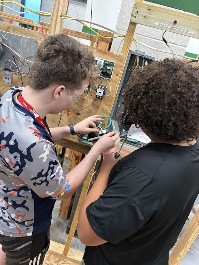JBHenslerCCA's tweet photo. Mr. Cantu's HVAC 1 students are turning classroom theory into real-world skills! After learning the concepts, they’re now in the shop installing generator plugs—just in time to prepare for hurricane season. https://t.co/6sfatA5FIW