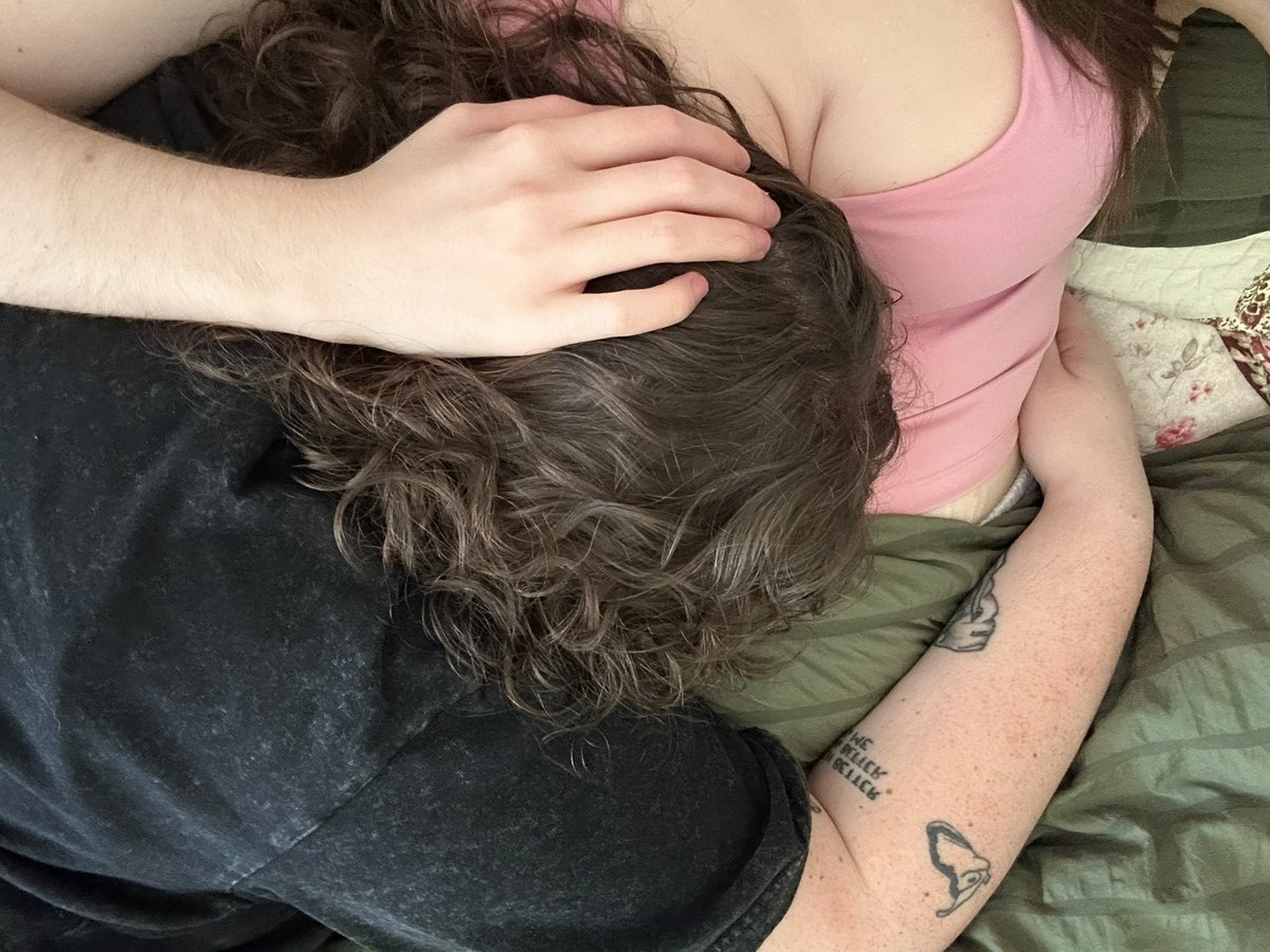 digitaldoubts's tweet image. fulfilling my femme duty as a pillow while my butch naps
