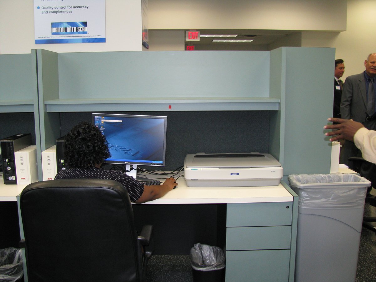This desk might not look like much—but it is a symbol of hope. CLB employs people who are visually impaired to convert paper files to secure, searchable electronic records. Every scan supports both efficiency and meaningful employment. 📞 202-454-6400 to convert your docs.
