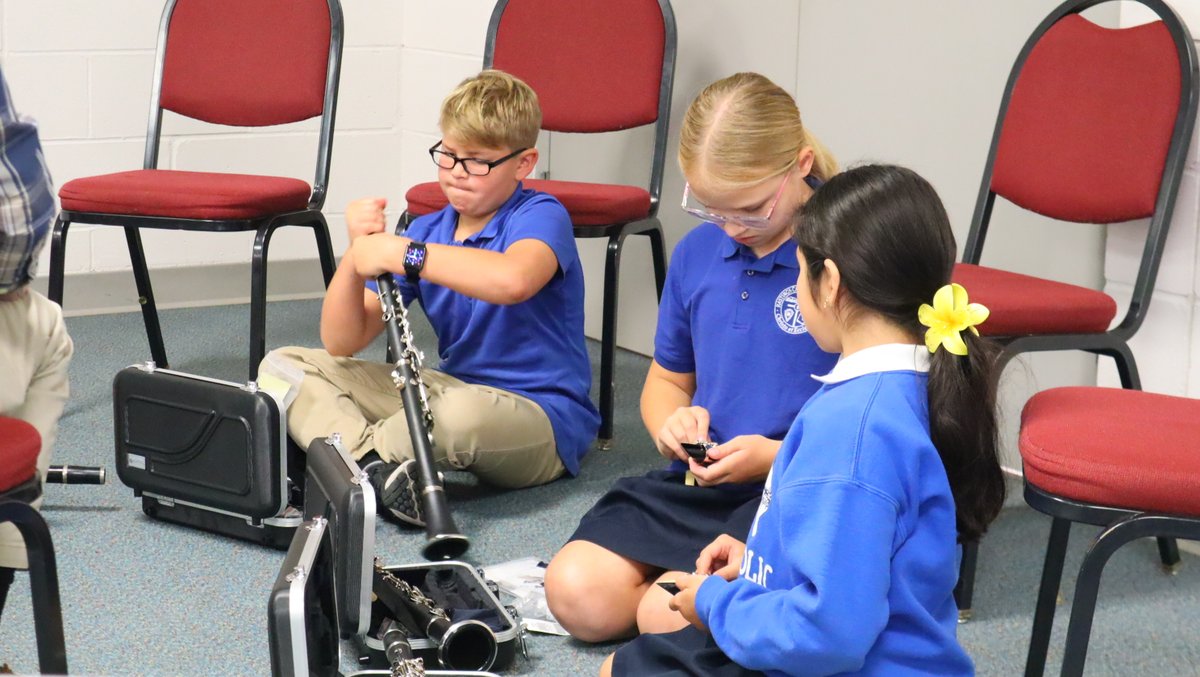 5th Grade Band at St. Michael Elementary is BACK!
Students, led by STC Band Director, Mr. Moore, are meeting in small groups weekly. Instruments are checked out at no-cost the family.  This year, 23 5th graders have joined the band!  What an exciting year for HCS music!   #AG2G