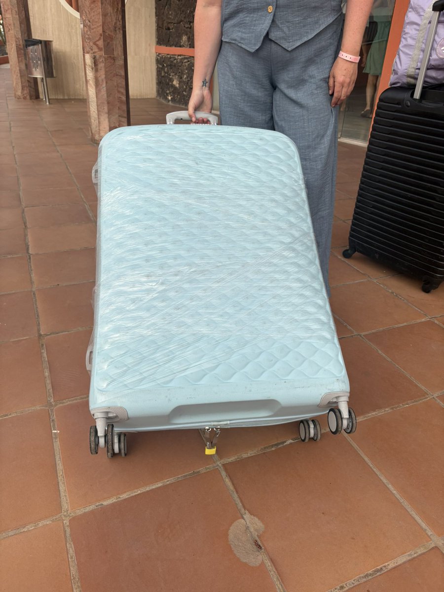 Rachel04xx's tweet photo. @Primark @itluggage suitcase been taken on 2 trips, couldn’t even make it back to the airport in one piece! had to buy a new lock and cling film because the zip kept bursting and stitching was coming away at one part 😡 
I’ve just bought a suitcase from elsewhere for another trip https://t.co/bnRctQqskU