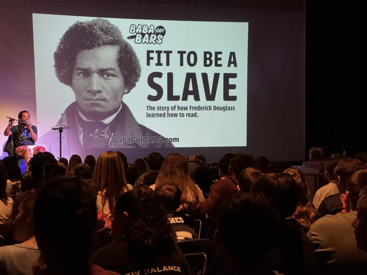 Today 6th grade was fully engaged in learning ELA skills as Baba Bomani used his hip hop talents to highlight the writing process and the stories of great American heroes.