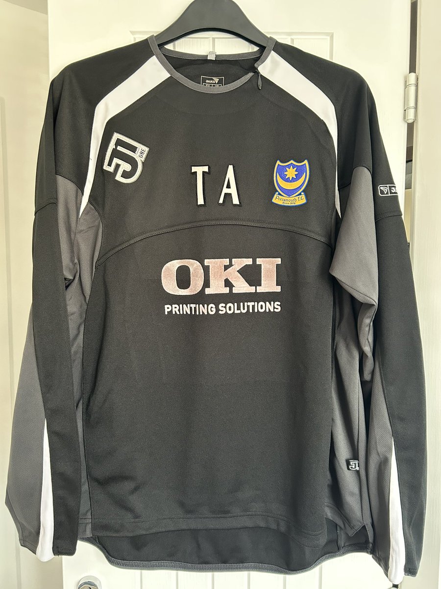 pompeyrick's tweet photo. Portsmouth staff issue training top. Prepared but not used. Tony Adams. https://t.co/XnvI0DUlCd