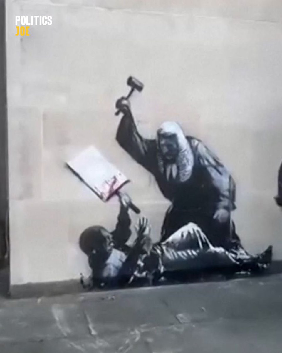 NEW: A painting by Banksy of a judge using a gavel to beat a protester on the walls of the Royal Courts of Justice in London has been removed.