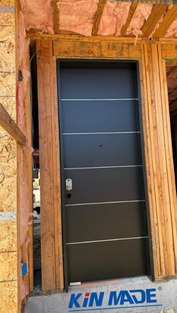 Kinmader's tweet photo. On-site install: 36×96 inch entry door with aluminum accents &amp; black oil-finished coating. Sleek lines + durable finish — already a standout at the construction site. 🚪
#EntryDoor #BlackDoor #BuildingMaterials #OnSite #Doors https://t.co/kVEf7vJ0ta