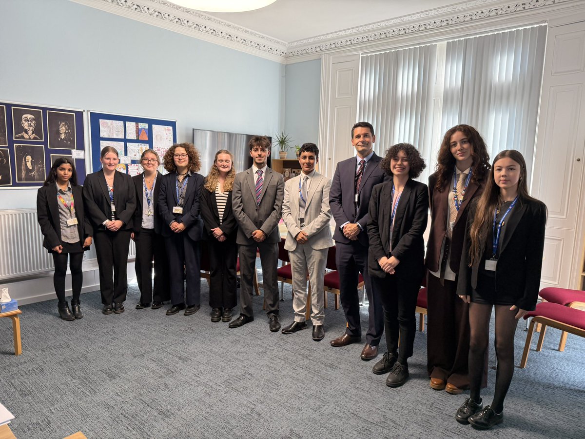 Here are our Intermediate Biology Olympiad students being congratulated by Mr Chislett.