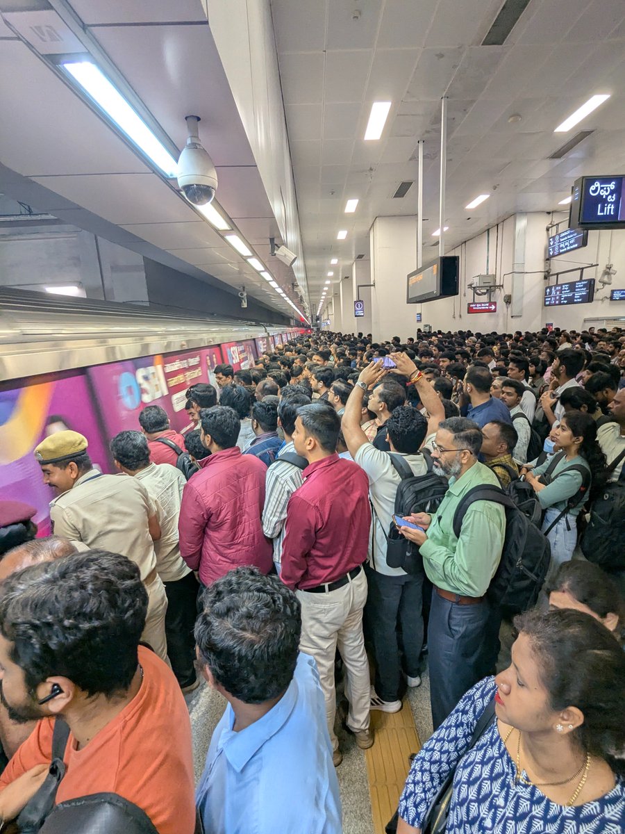 impramod's tweet image. Peak hours in #NammaMetro = peak chaos.  No proper frequency, 3 trains arriving back-to-back, massive crowd mismanagement. Commuters pay premium fares but get zero service. #NammaMetro #Bengaluru"
@OfficialBMRCL  @RailMinIndia @Tejasvi_Surya
