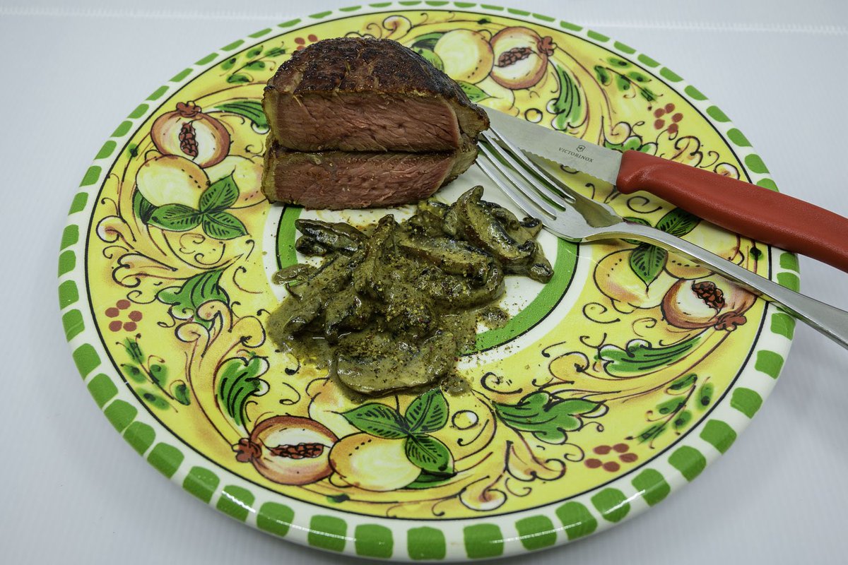 Grain-fed scotch fillet steak cooked sous vide with mushroom and Dijon mustard sauce.