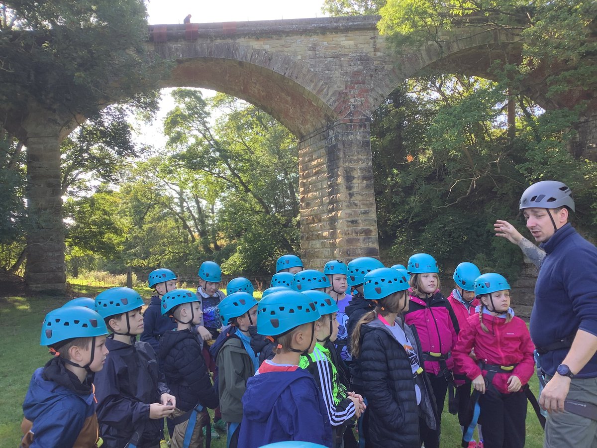 SiggsCEPrimary's tweet photo. The children have abseiled this morning off an disused railway bridge, they were very brave!  The children have had a great morning in the sunshine. https://t.co/O1cSvHQH8C