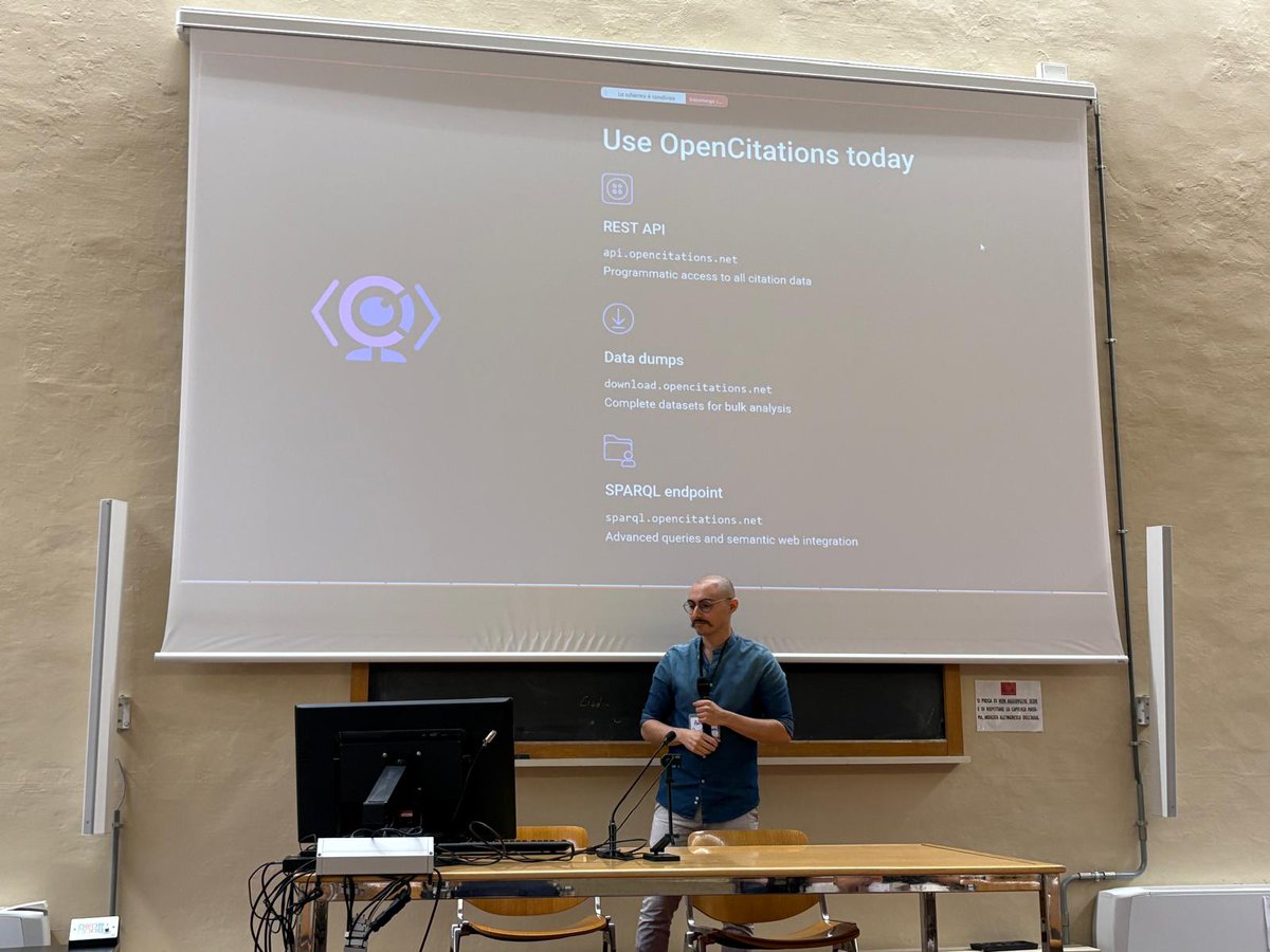 Happening now: <a href="/arcangelo_wd/">Arcangelo Massari</a> at #csvconf presenting "Automated citation crowdsourcing: extending scholarly data coverage through community contributions" #opencitations