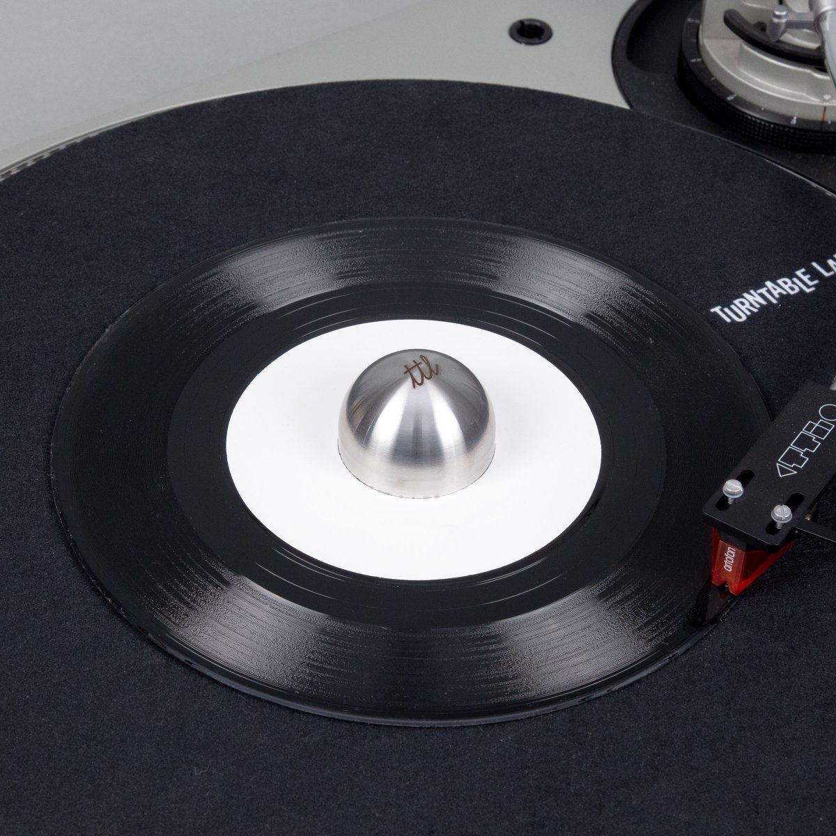 TurntableLab's tweet photo. 🆕 Sure Shot Dome 45 Adaptor - TTL Edition!
↘dome shaped for easy record swapping, HQ stainless steel engraved w/ Lab graphics on top + bottom, silver or brass finish:
⇢ https://t.co/3g2PnO1SNB
#45adapter #nowspinning #45adaptor #ttleditions #ttlexclusivo #ttlhifi #ttldj https://t.co/R9N9s3YMbg