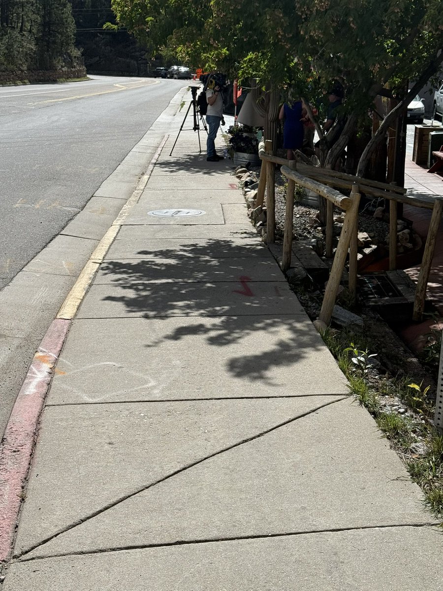 Media swarming Evergren co post shooting