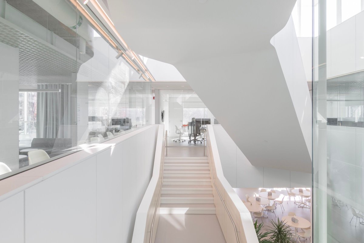 Archello's tweet image. Chevalier Morales @cmarchitectes transforms Fondaction’s Montreal headquarters into a carbon-neutral workplace through selective deconstruction, material reuse, and smart energy systems. 
buff.ly/emx1Zky 

#CarbonNeutralDesign #SmartBuilding #MaterialReuse