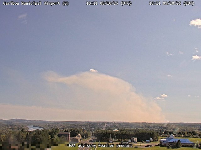 NWSCaribou's tweet photo. This large column of smoke seen south of the Caribou Airport on the FAA Webcam is a controlled Burn in Presque Isle per Presque Isle Fire Department. The Fire Department is aware of it. The fire/smoke between the Caribou, McBurnie and Chandler Roads #MEwx #MEFire #Maine https://t.co/c7wVKyrN5S