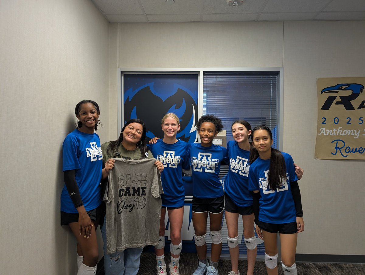 The 8th grade Volleyball team gifting <a href="/mrs_romanelli/">Crystal Romanelli</a> a volleyball shirt. <a href="/DrAnthonyMS/">Anthony Middle School</a>
