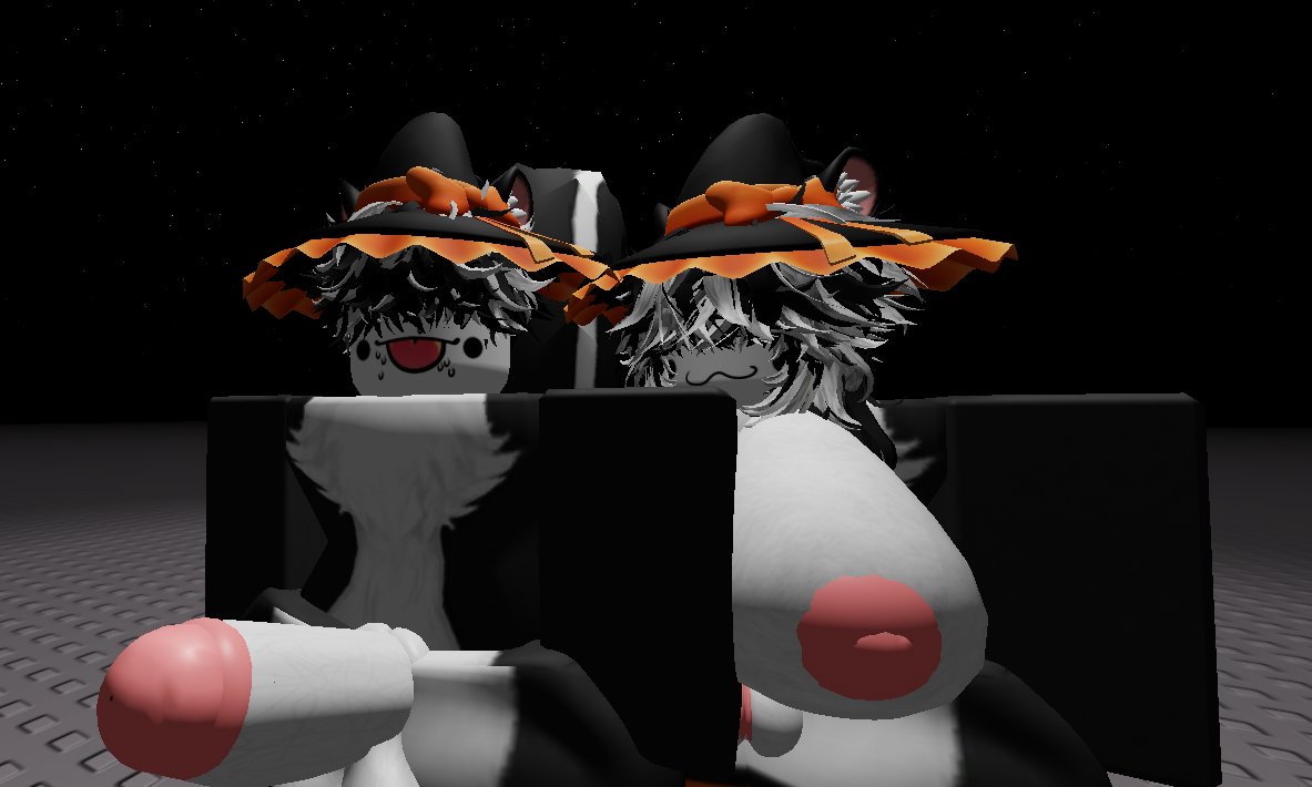 A Robloxian revealing their bare chest in a suggestive pose