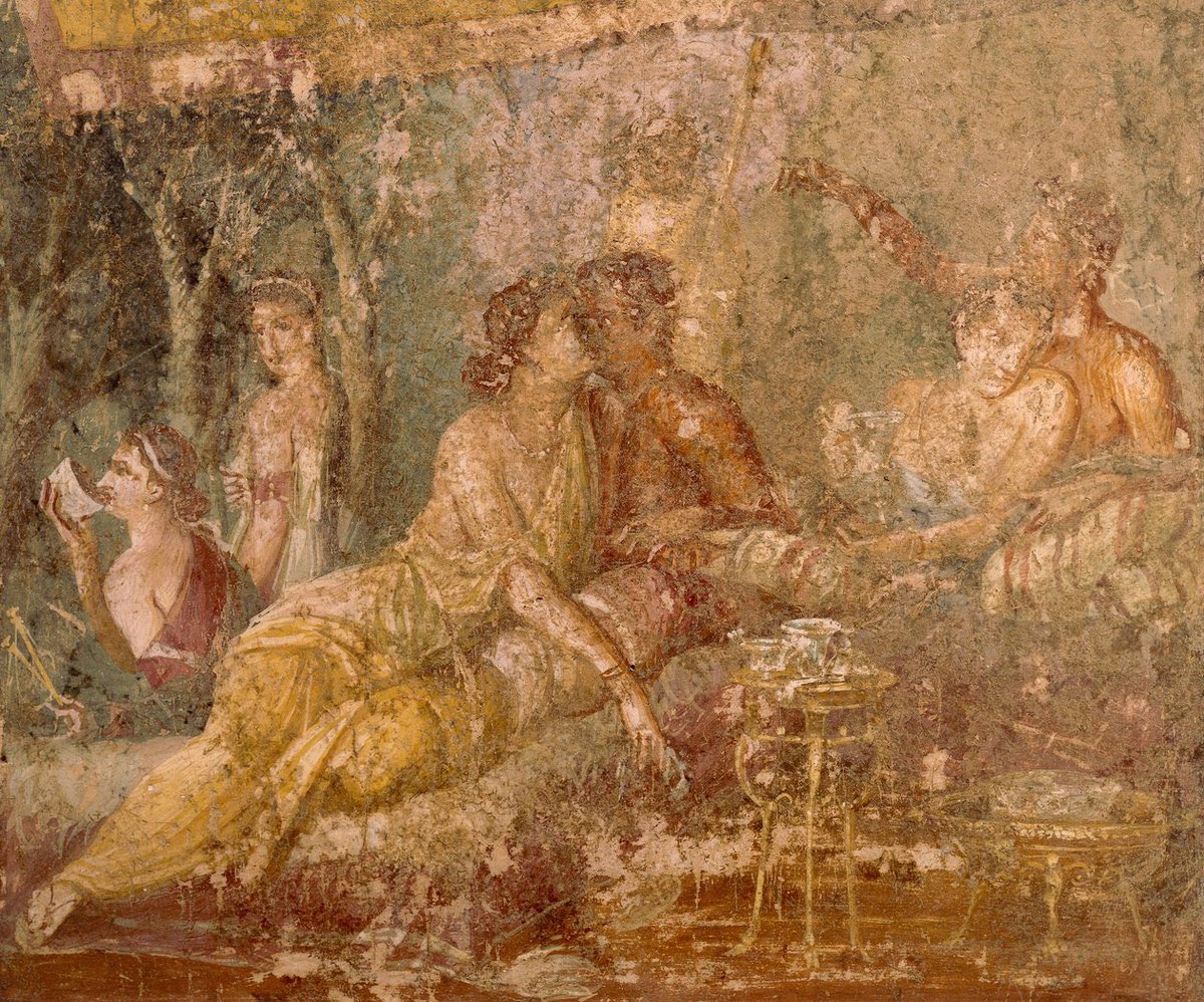 Fresco que representa una escena de triclinio, de Pompeya.
Museo arqueológico nacional de Nápoles.
