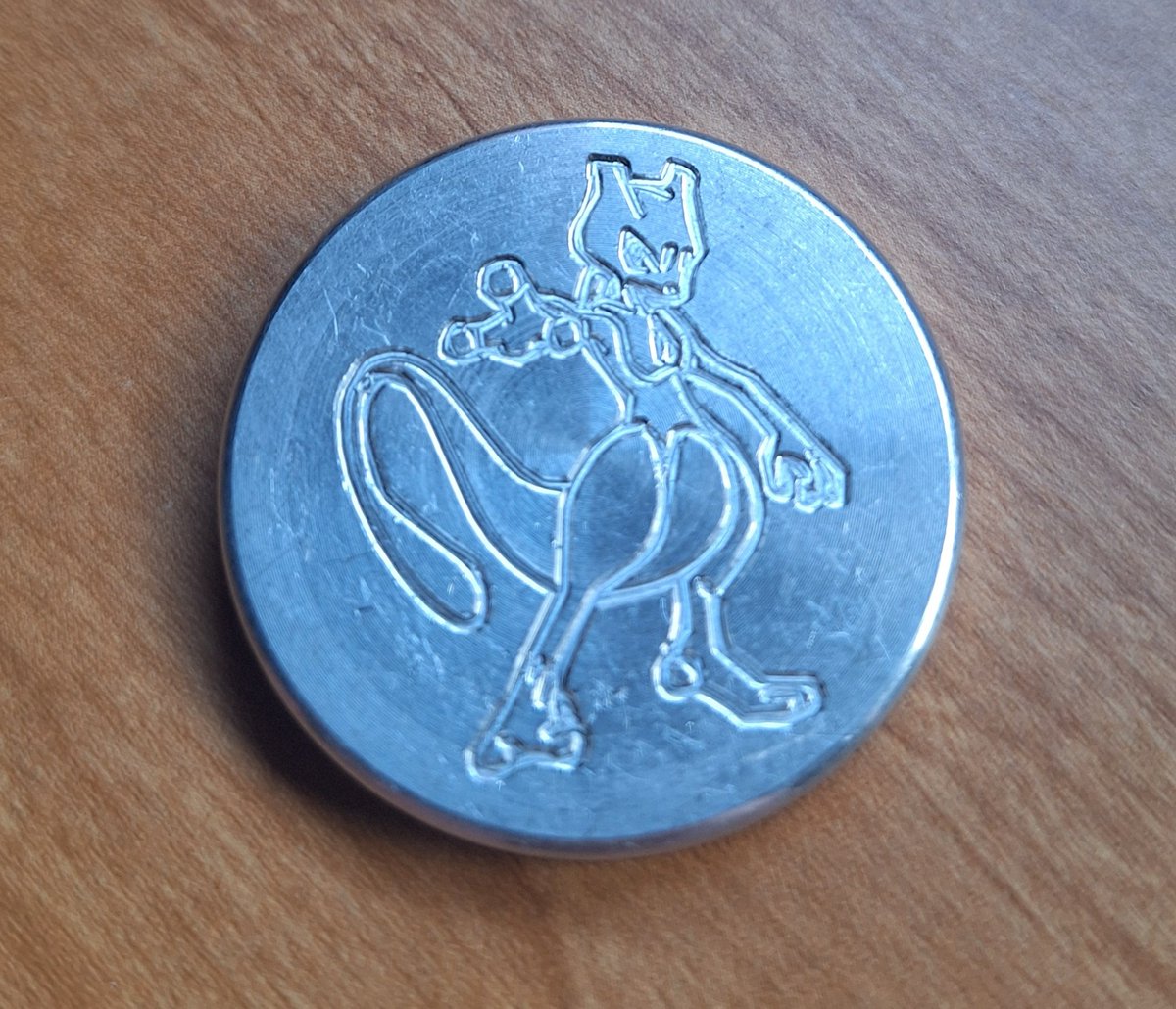 ac_des1gns's tweet image. Custom engraved Mew and Mew 2 coin made out of aluminum! #pokemon #cncproject #cncidea #projectidea