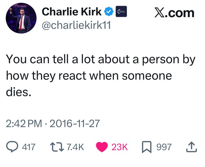 A screenshot of a social media post from X. The post includes a profile picture of Charlie Kirk, showing him speaking at an event, wearing a red tie and dark suit. Text overlay includes the username @charliekirk11, the post text "You can tell a lot about a person by how they react when someone dies," timestamp "2:42 PM \u2022 2016-11-27," and engagement metrics with 7.4K retweets, 23K likes, and 997 replies. An X logo is visible in the top right corner.