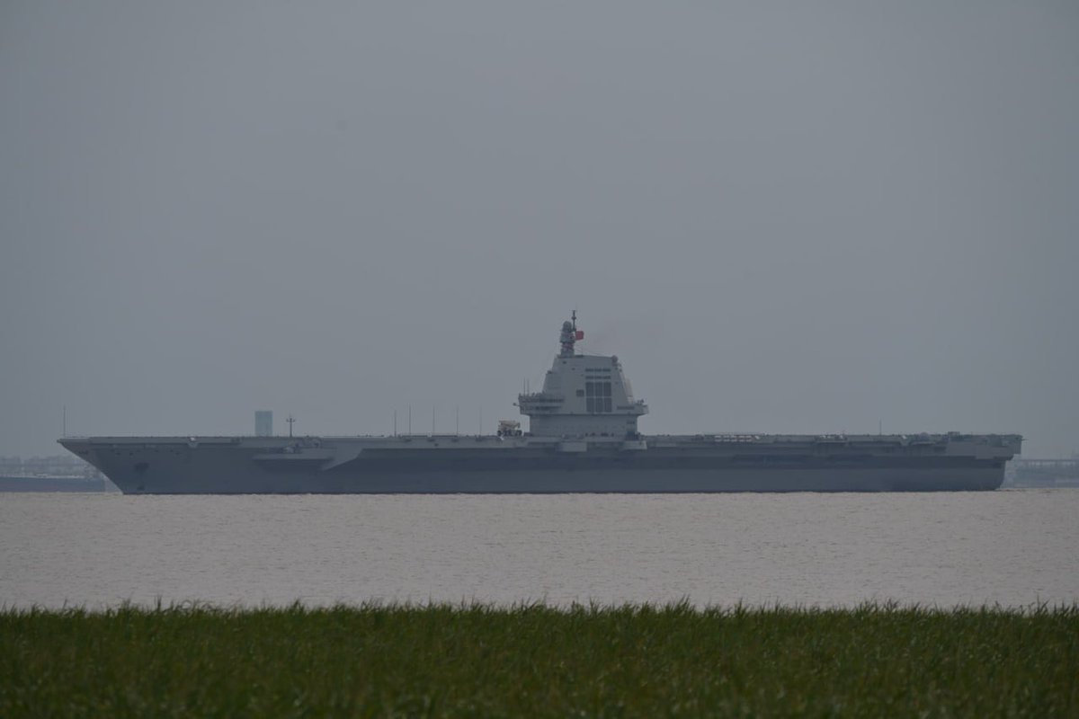 China Moves - 1 Step Awaiting: The third Chinese aircraft carrier, "Fujian," is currently moving southward along the Taiwan Strait, accompanied by tugboats. The deck is clear of any aircraft.

It is assumed that the carrier's course is directed towards Sanya, where it may be