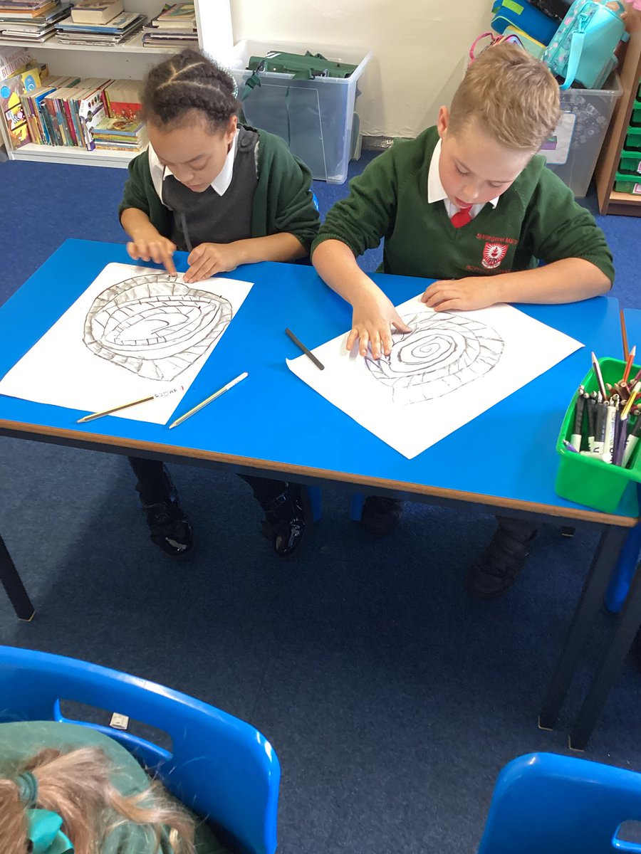 Year 3/4 are using charcoal to explore Chiaroscuro - light and dark #art #lightanddark #fossils