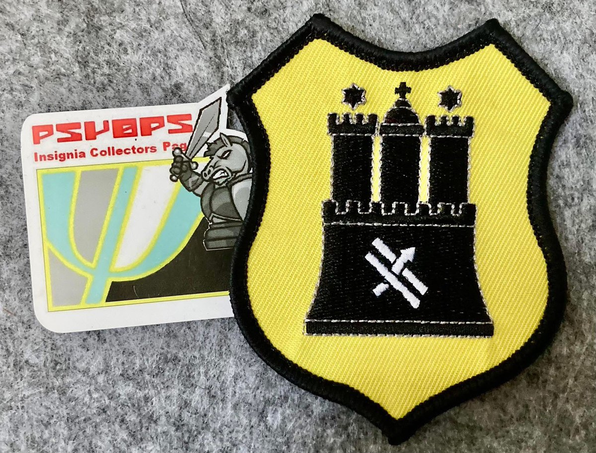 An incredibly interesting and rare patch worn by a select few Operative Kommunikation (PSYOPS) students at the Bundeswehr University in Hamburg. 

This OpKom UniBW patch is designed and issued by the student body fraternity.