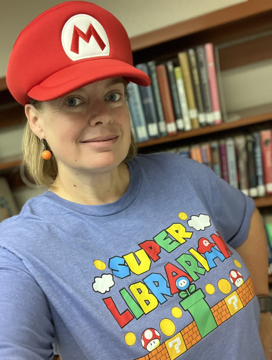 🎮#Wiggs Librarian “fit check”!  Guess what’s happening in the library today during lunch shifts #Wolverines? 🎮