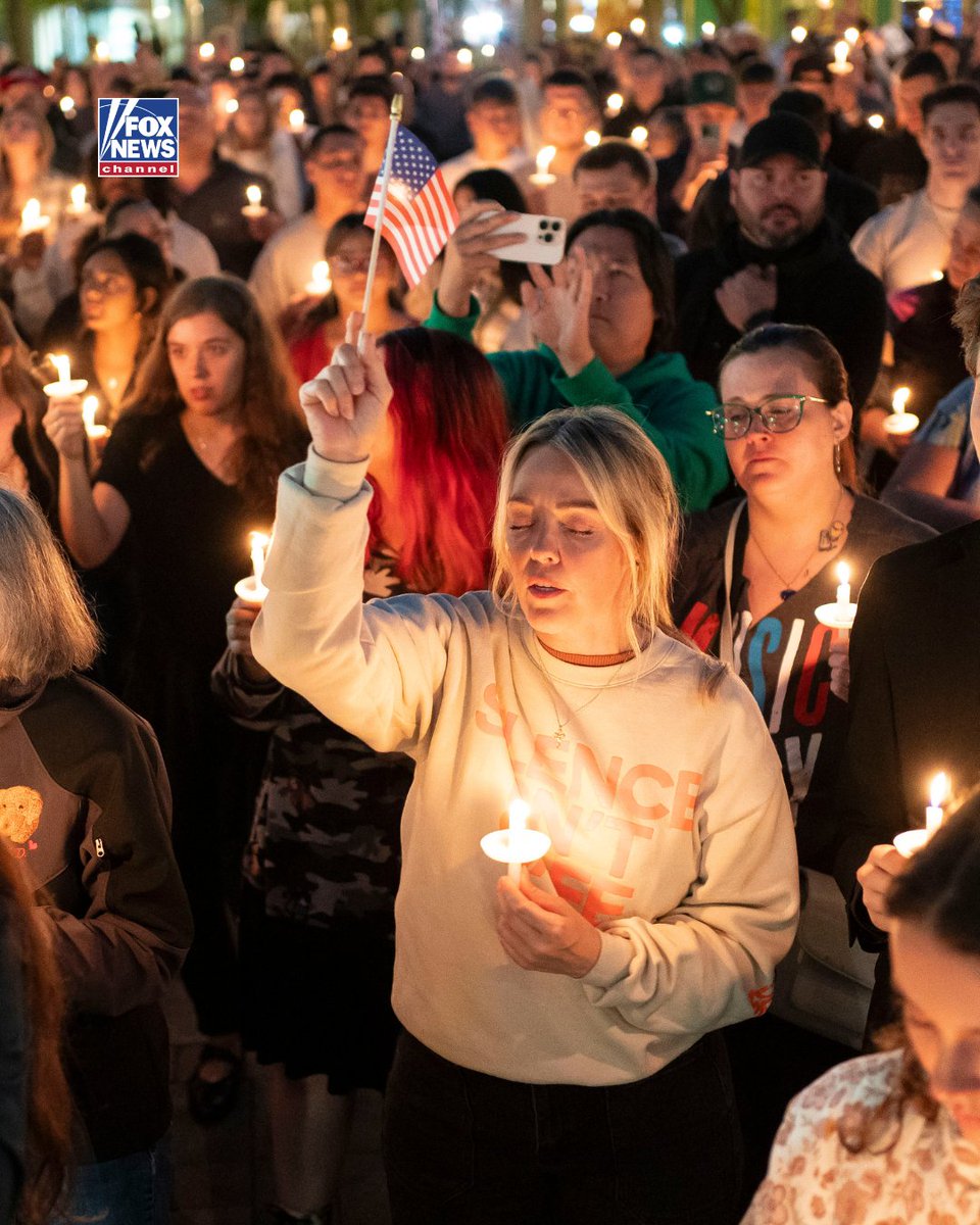 FoxNews's tweet photo. 'CHARLIE IS OUR HERO': Americans pay respect to Charlie Kirk at pop-up vigils across the nation, after the Turning Point USA founder was assassinated while speaking at Utah Valley University on Wednesday. https://t.co/Sw0nRBf5sP
