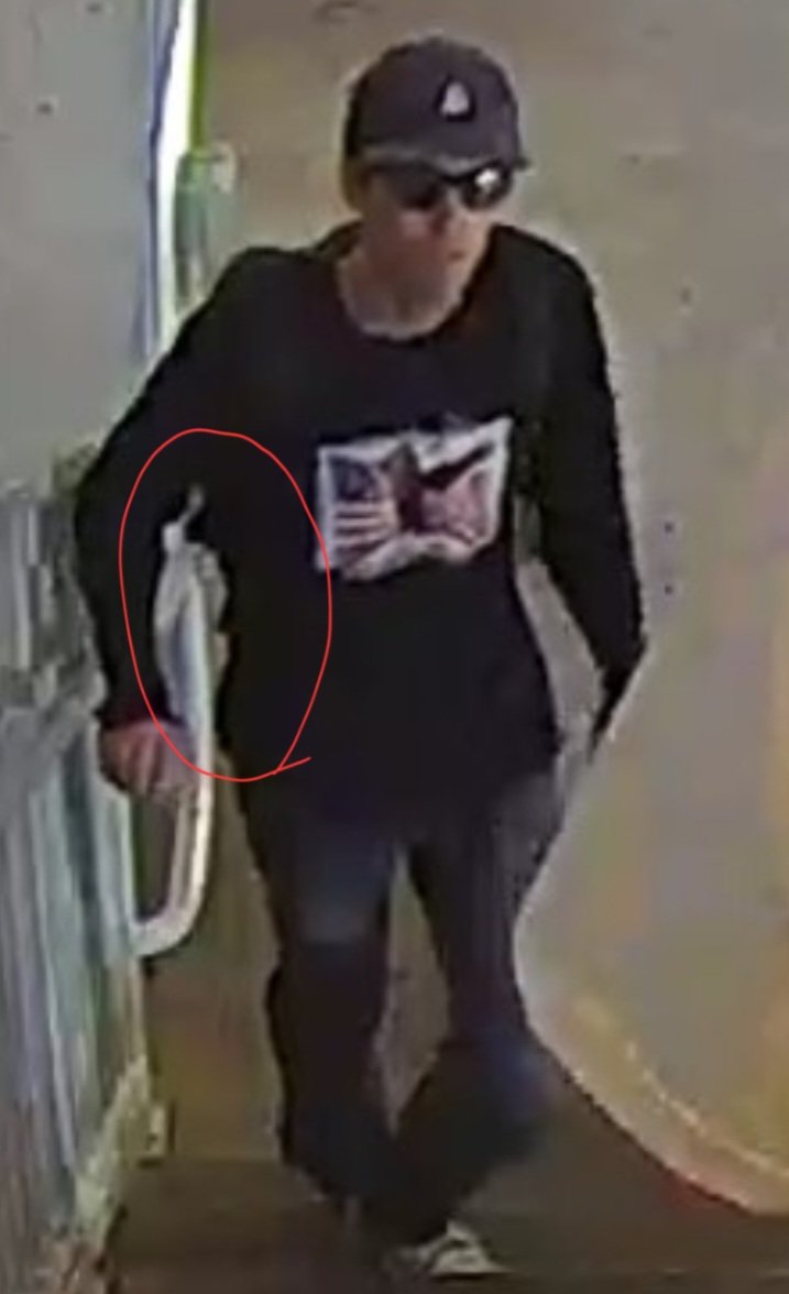 Person of interest? I can see the long gun on his back.