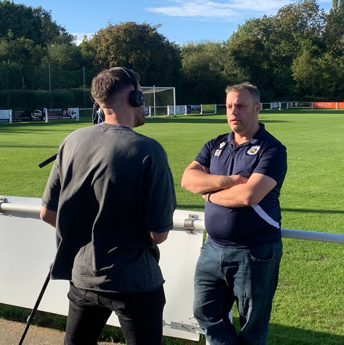 Mulbarton FC (Men’s) (@mulbartonfc) on Twitter photo 🎥 Behind the scenes..
It was a pleasure to welcome <a href="/itvanglia/">ITV News Anglia</a> to The Abode Arena this evening to discuss our FA Cup run with gaffers <a href="/btommo84/">Ben Thompson</a> & <a href="/SelfyDan/">Danny Self</a> and all things club related with new Chairman <a href="/GrahamBuntingUK/">Graham Bunting 💙</a>. Tune in throughout the day and at 6pm tomorrow evening 💙🖤 🎥 Behind the scenes..
It was a pleasure to welcome <a href="/itvanglia/">ITV News Anglia</a> to The Abode Arena this evening to discuss our FA Cup run with gaffers <a href="/btommo84/">Ben Thompson</a> & <a href="/SelfyDan/">Danny Self</a> and all things club related with new Chairman <a href="/GrahamBuntingUK/">Graham Bunting 💙</a>. Tune in throughout the day and at 6pm tomorrow evening 💙🖤