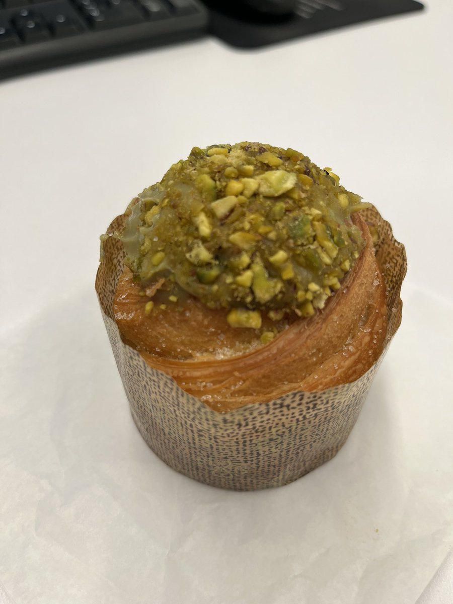 Felt like I needed a walk and a treat to improve my mood.  Got this Pistachio Cruffin.  Croissant dough shaped like a muffin filled with pistachio cream.