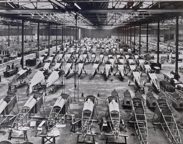 12 September 1918. Sopwith Ham Factory. Seven ‘Salamander’ aeroplanes in the foreground with some stock armour plate “boxes”. Complete fuselages and duplicated jigs and fixtures in the bays either side.