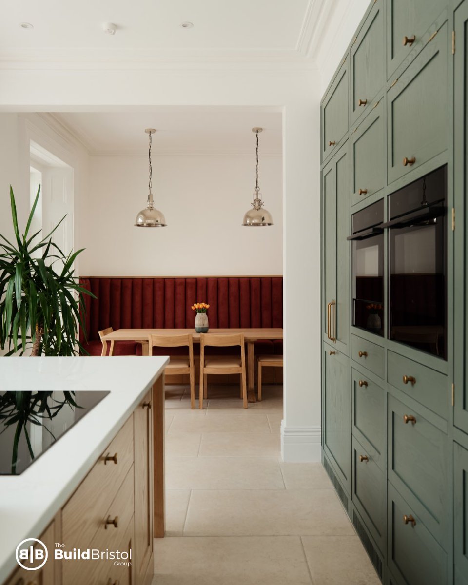 A seamless blend of style and functionality ✨

This bespoke kitchen-diner balances soft natural tones with bold accents. The deep red upholstered banquette creates a cosy dining nook, perfectly complemented by warm timber seating and a simple statement table.