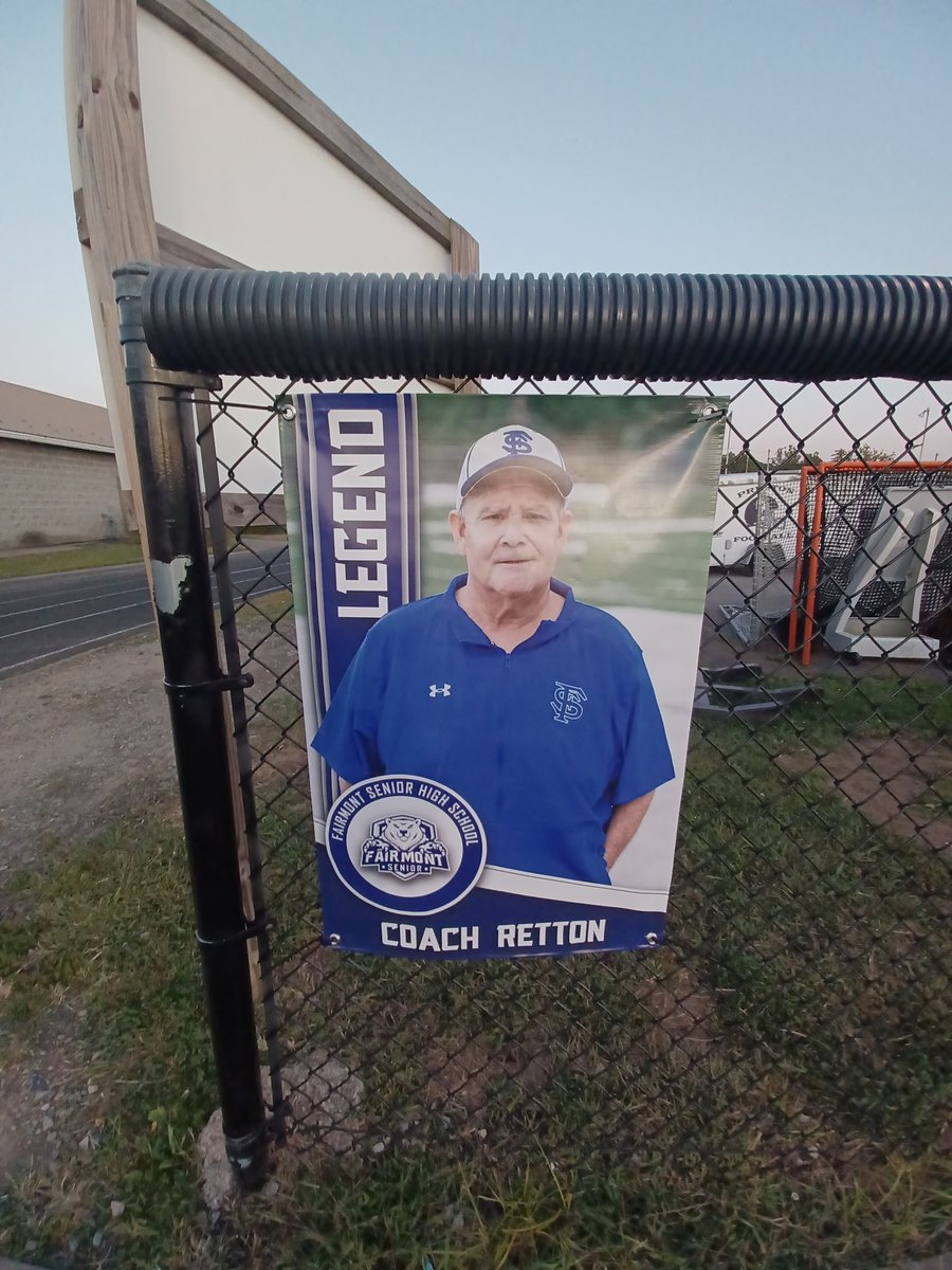 Classy move by Fairmont Senior High School to honor longtime assistant coach Donnie Retton with this display by the team entrance at East-West Stadium. 

Retton passed away last December. #wvprepfb