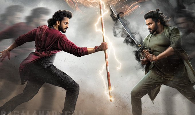 Teja Sajja and Manchu Manoj in dynamic combat poses. Teja Sajja holds a glowing staff, wearing a red shirt and black pants. Manchu Manoj wields a sword, dressed in a green outfit. Sparks and smoke surround them, indicating an intense action scene.