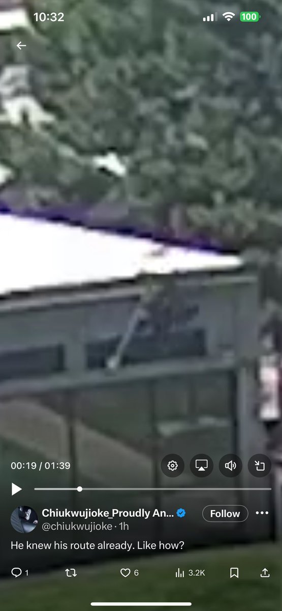 VictorWade's tweet photo. For all the ones saying they don’t see the gun, Zoom in as close as you can at the place where he went to jump off the building. You can see him lower the gun bag to the roof, then after he got his legs hanging down you can see him grab it and hoist it down. Then when he jumps you can see the gun bag against the reflection of the glass as he’s midair. Go to that point in the video, zoom in and you’ll see it more fluidly. Also go frame by frame to watch. Here’s screenshots